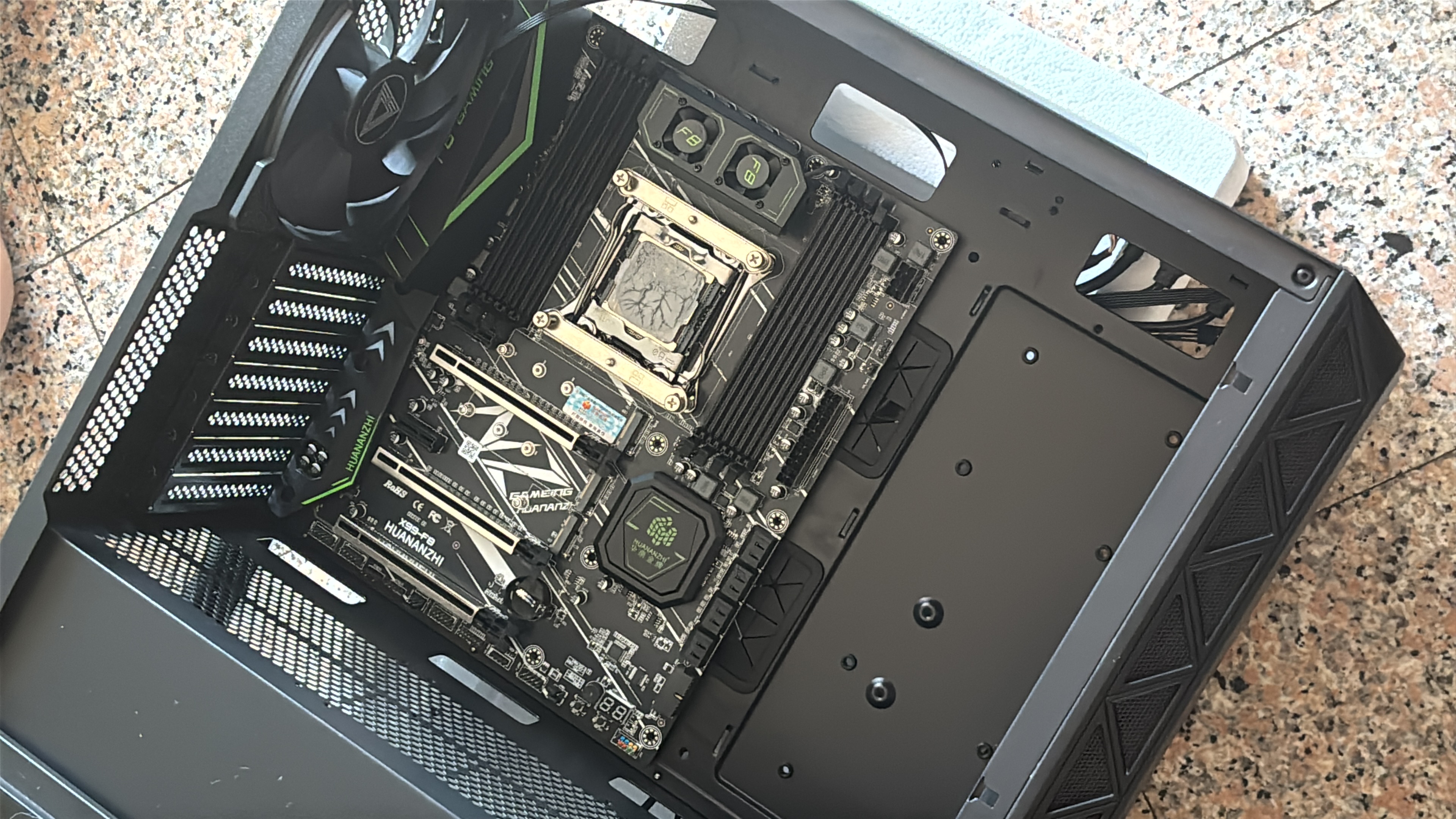 The workstation parts being assembled on a desk